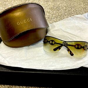 Gucci sunglasses with Mask Shaped Frame